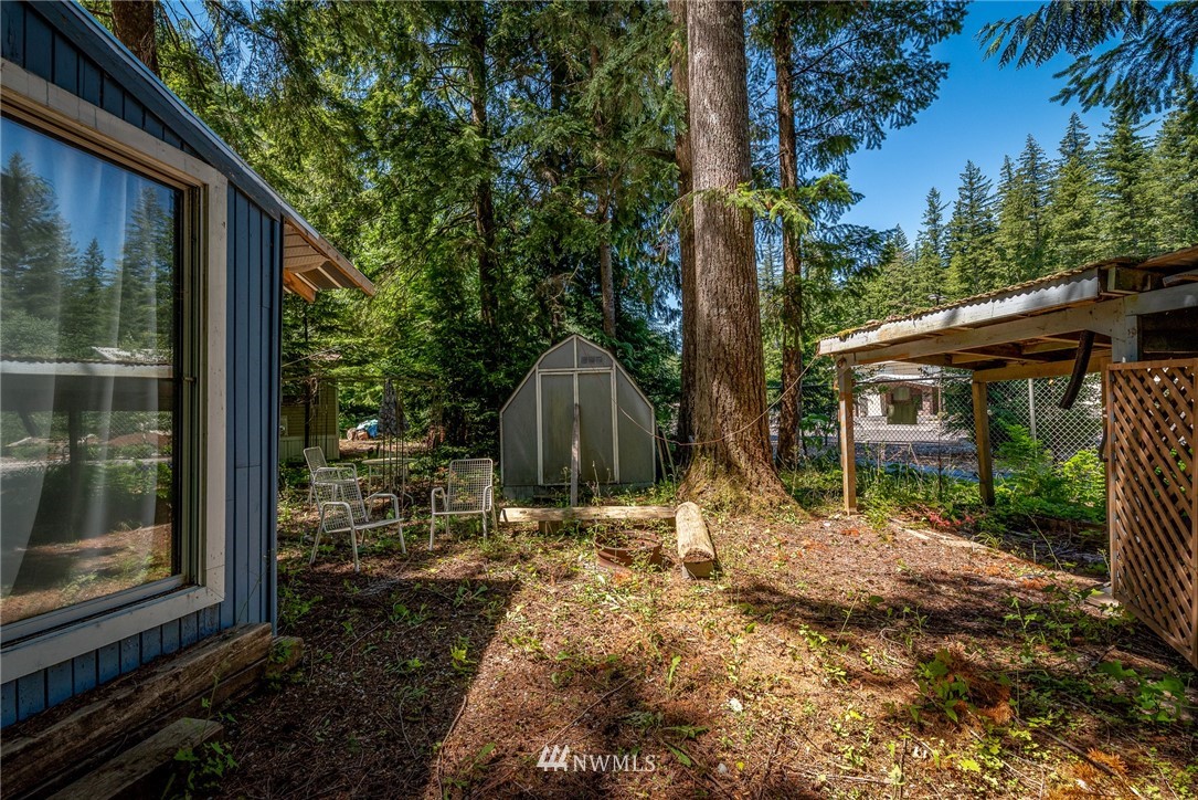 3031 Tower Road Maple Falls, WA 98266 - Photo 17 of 22 a backyard of a house with lots of green space