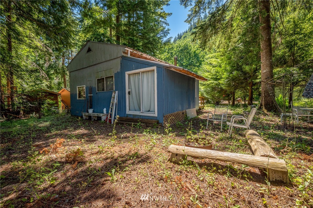 3031 Tower Road Maple Falls, WA 98266 - Photo 18 of 22 a backyard of a house with lots of green space