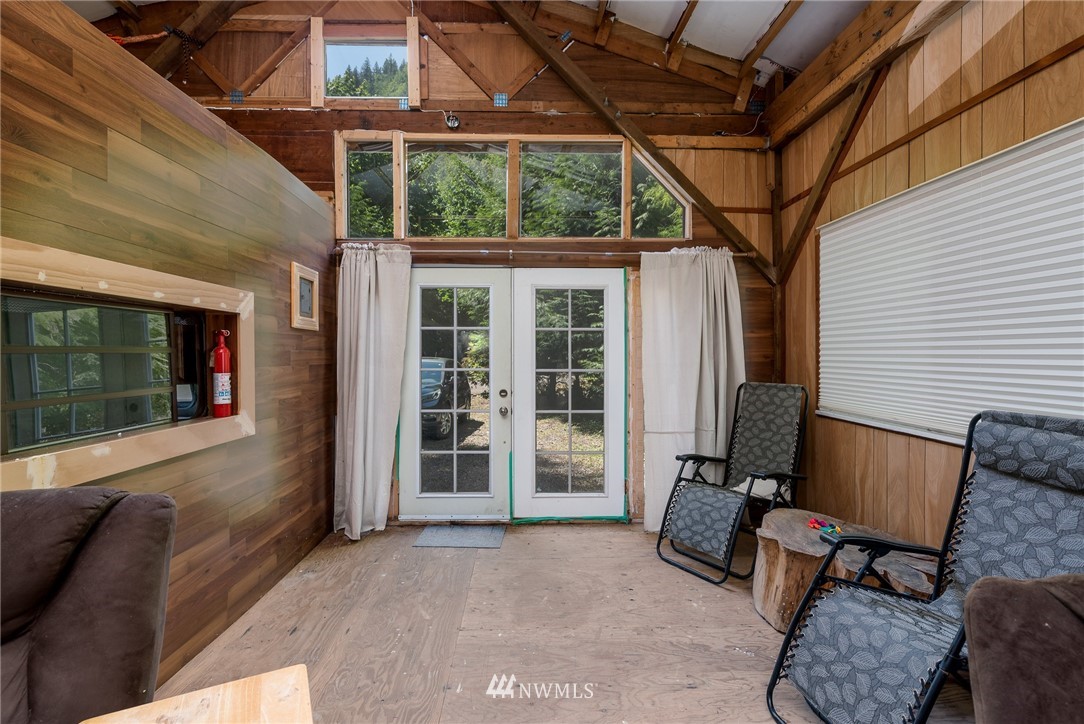 3031 Tower Road Maple Falls, WA 98266 - Photo 4 of 22 a balcony with furniture and a potted plant