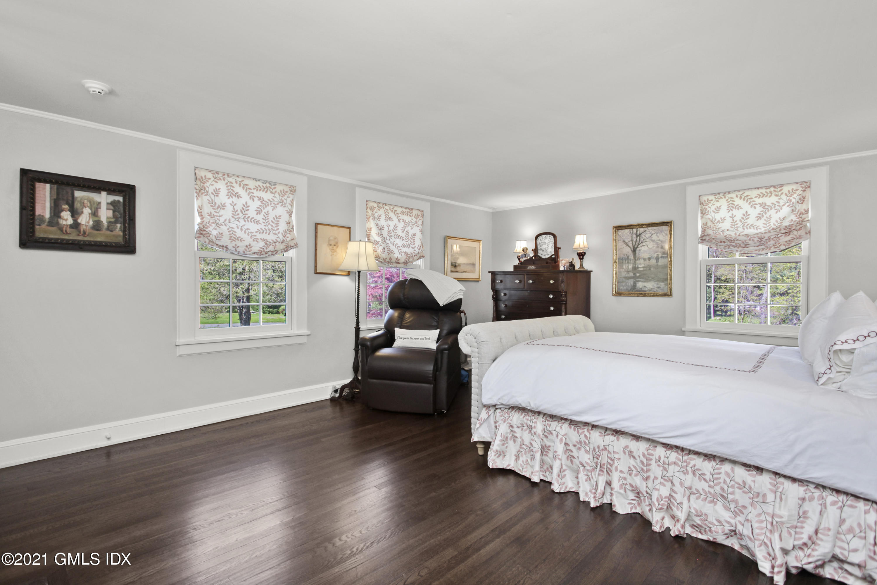 75 Calhoun Drive Greenwich, CT 06831 - Photo 16 of 25 a bed room with a bed and a large window