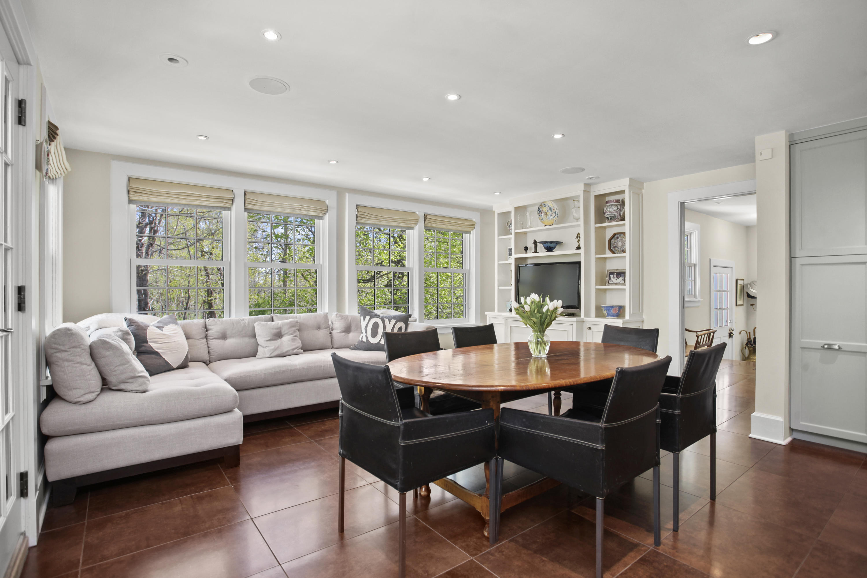 75 Calhoun Drive Greenwich, CT 06831 - Photo 7 of 25 a living room with furniture and a large window