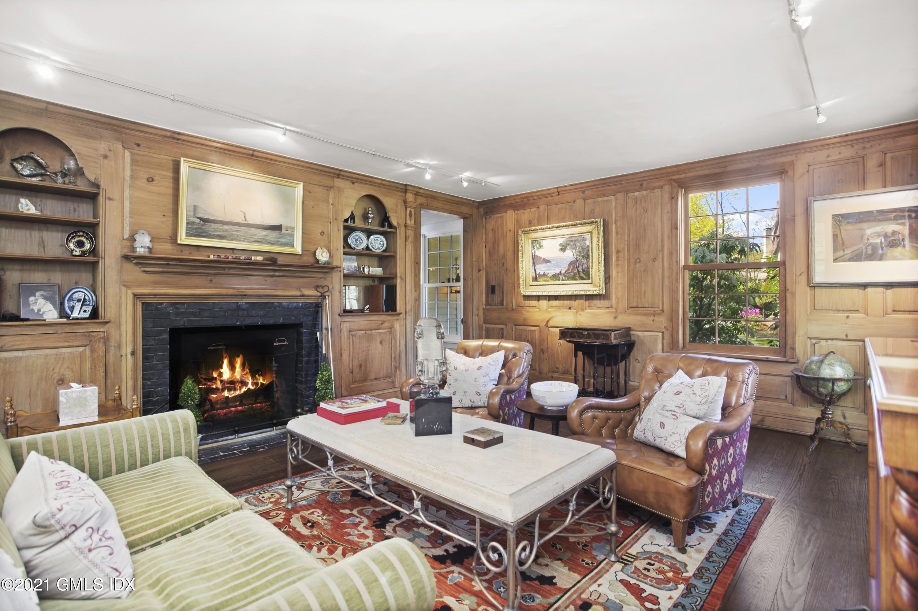 75 Calhoun Drive Greenwich, CT 06831 - Photo 8 of 25 a living room with furniture fireplace and window