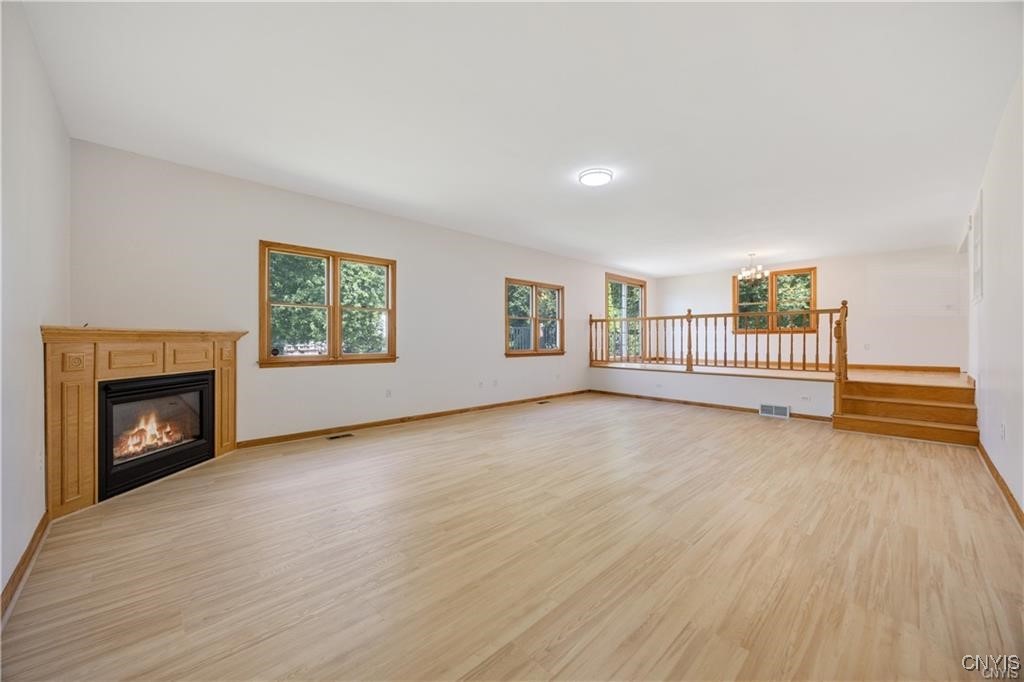 7661 Totman Road Cicero, NY 13212 - Photo 16 of 34 Familyroom looking into eating/dining area