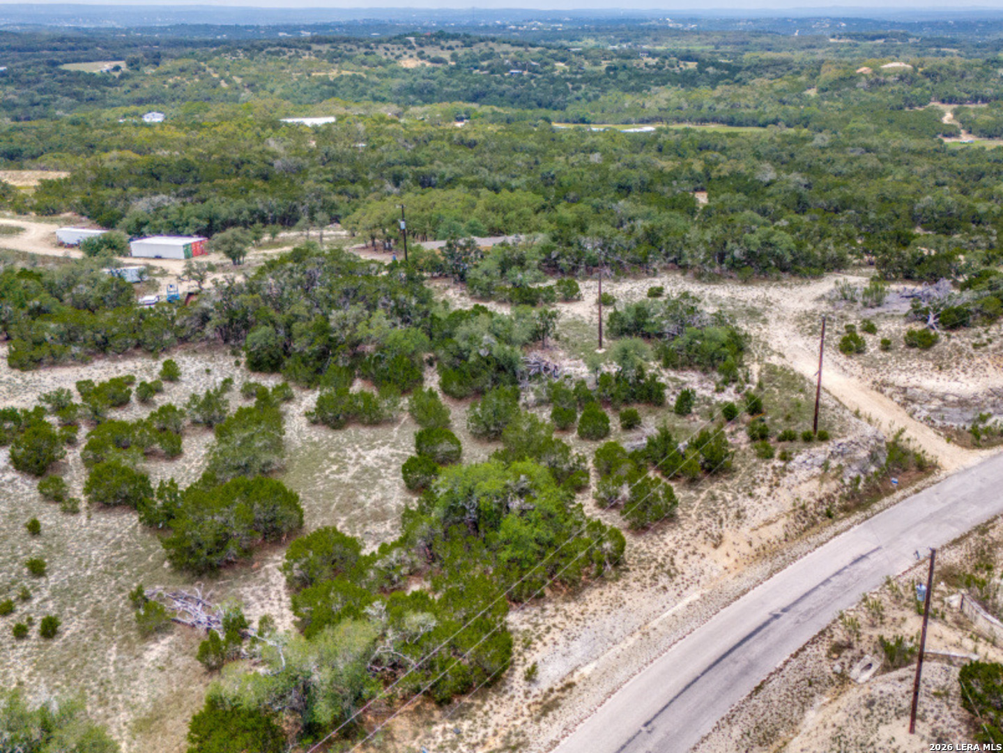 1578 Primrose Path Spring Branch, TX 78070 - Photo 1 of 10 a view of a city with green field