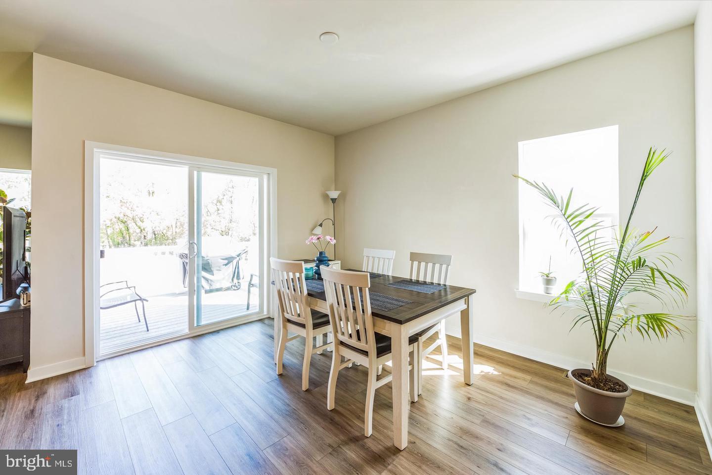 727 Hunsberger Road Spring City, PA 19475 - Photo 11 of 32 a view of a dining room with furniture and wooden floor