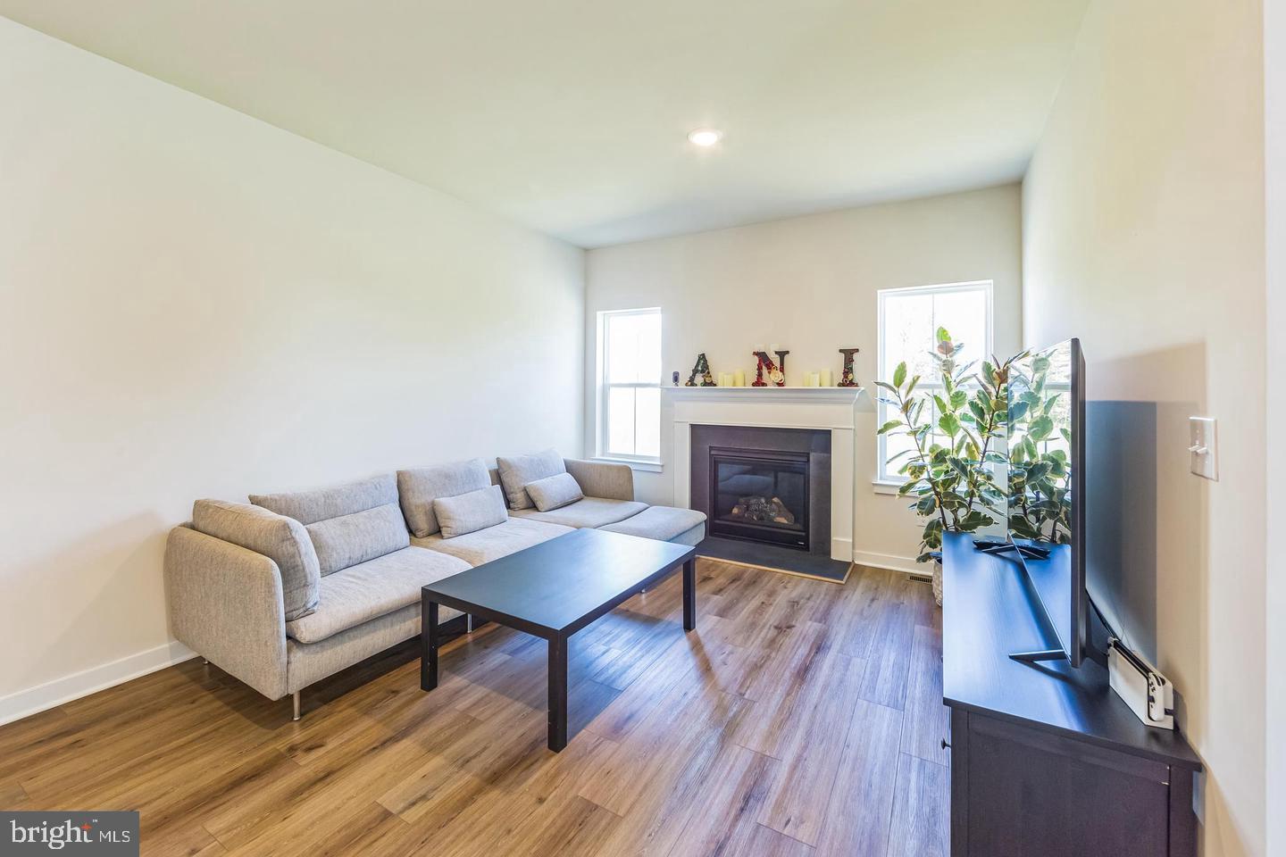 727 Hunsberger Road Spring City, PA 19475 - Photo 13 of 32 a living room with furniture and a fireplace