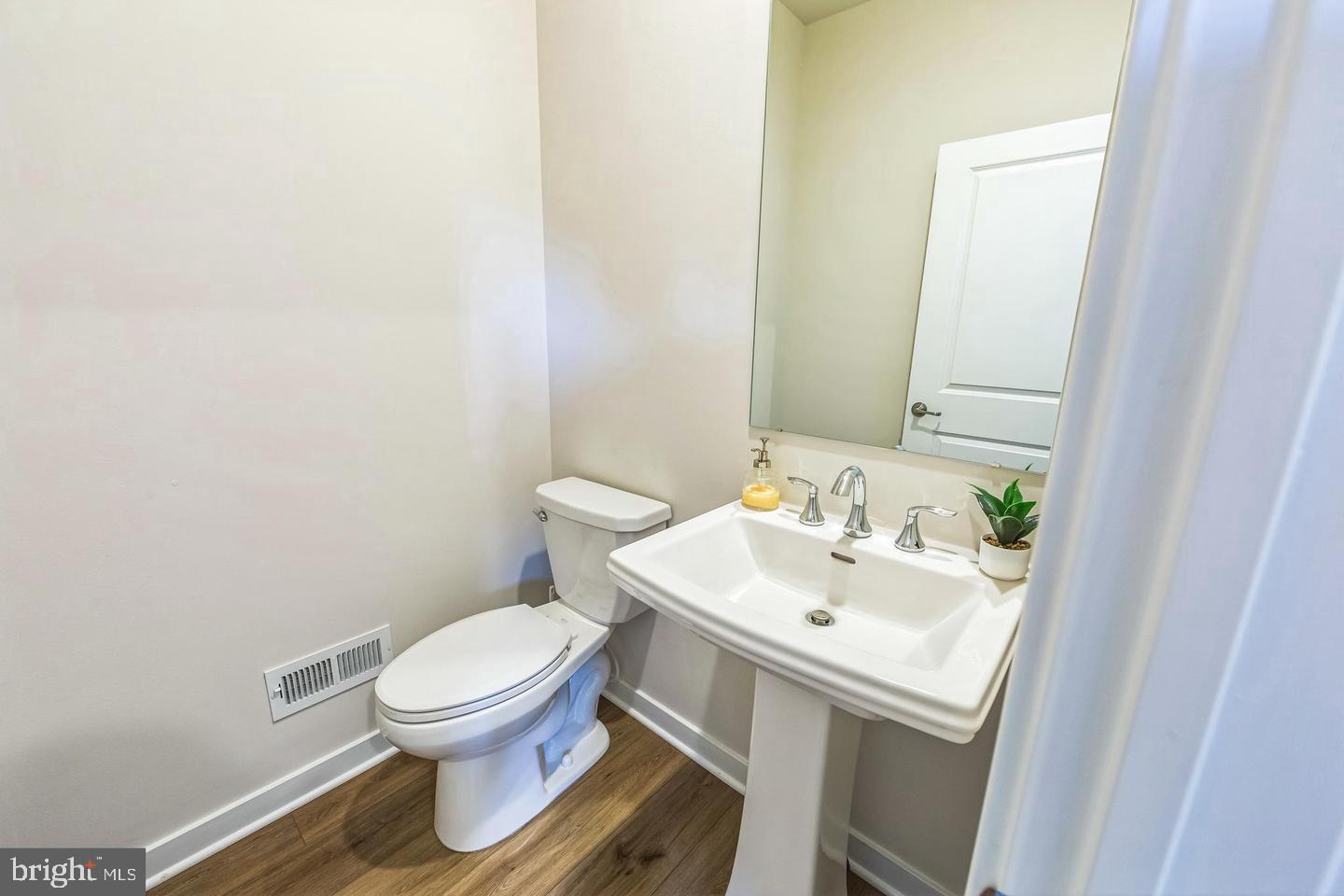 727 Hunsberger Road Spring City, PA 19475 - Photo 15 of 32 a white toilet sitting next to a bathroom sink