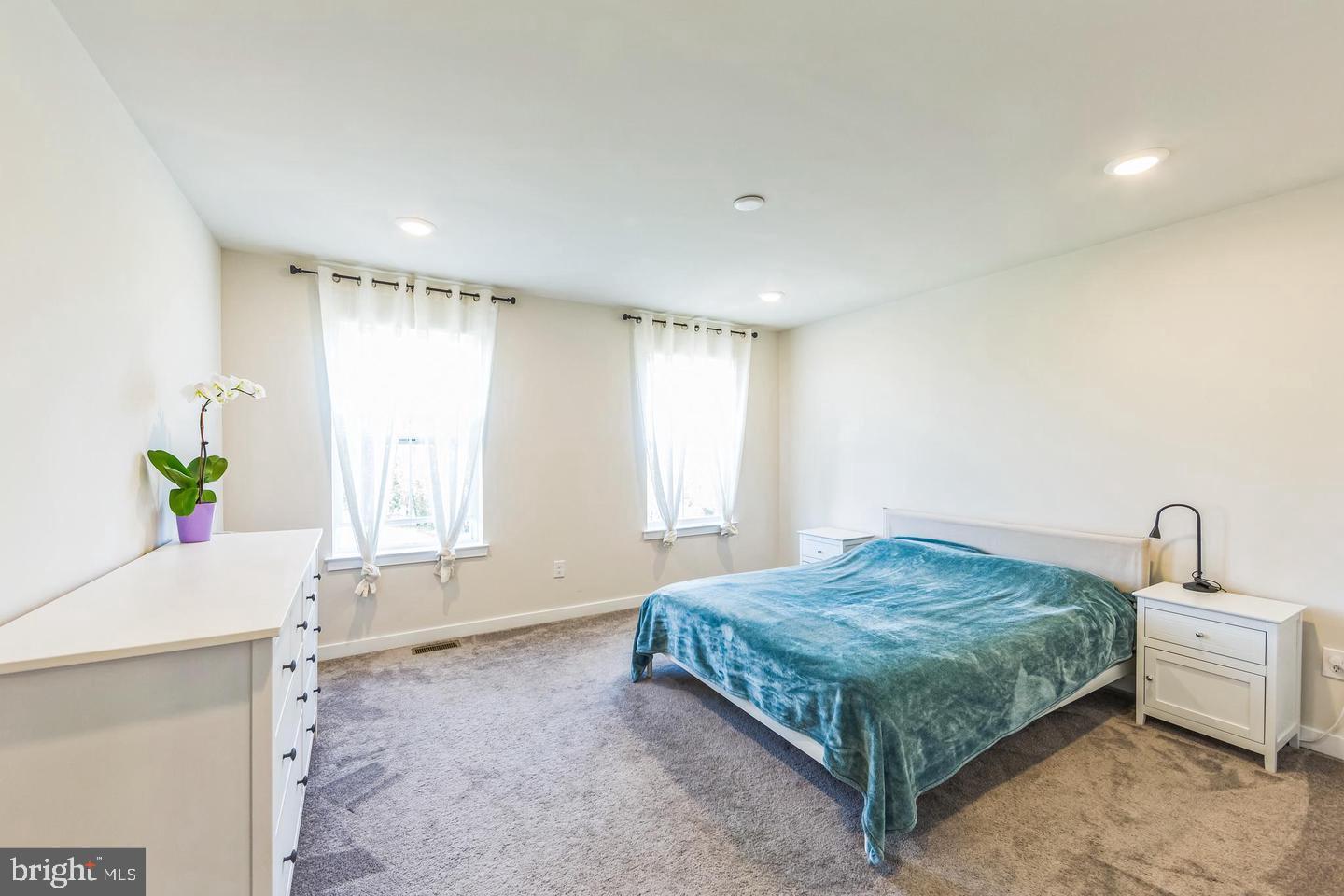 727 Hunsberger Road Spring City, PA 19475 - Photo 17 of 32 a bedroom with a bed and a window