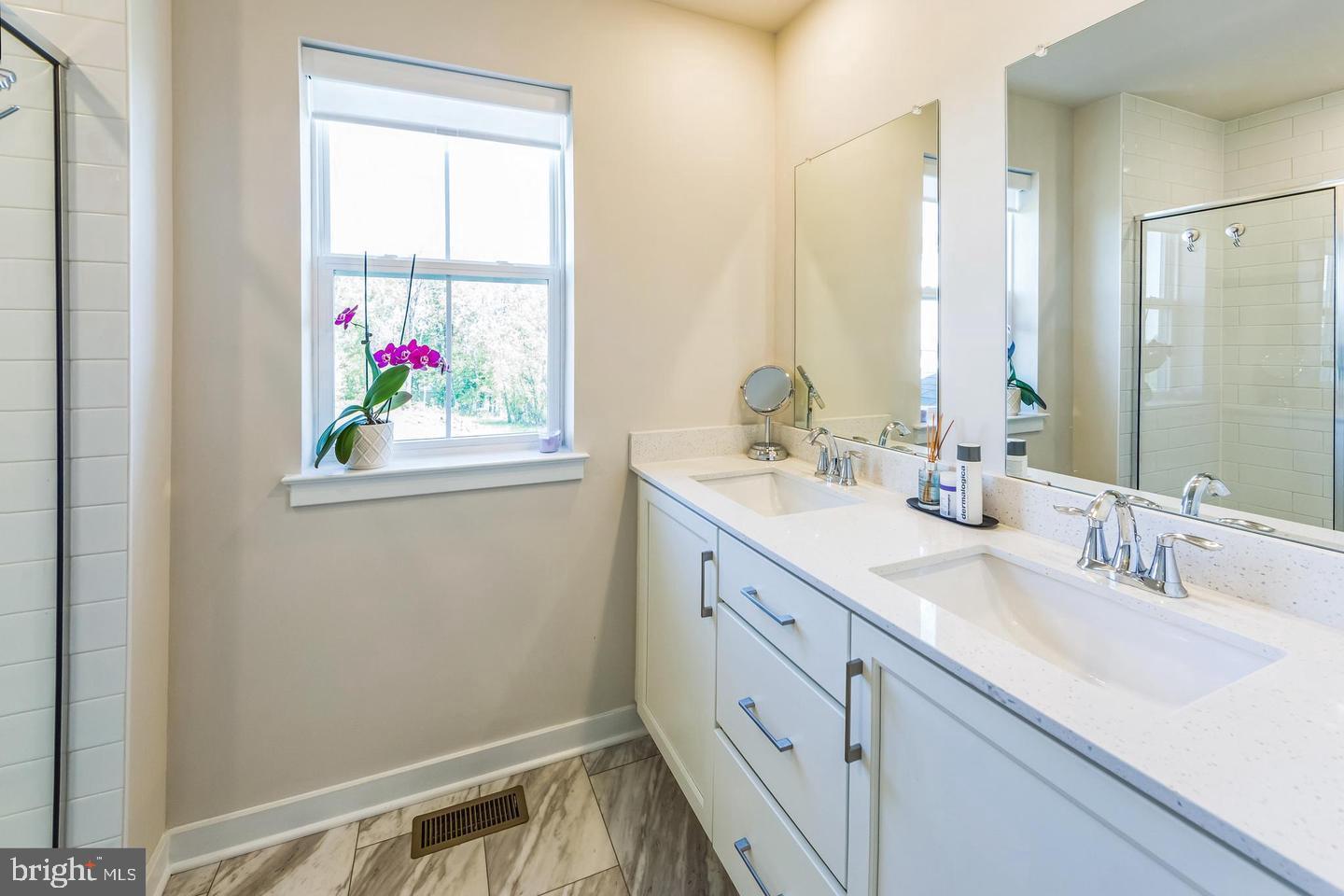727 Hunsberger Road Spring City, PA 19475 - Photo 20 of 32 a bathroom with a sink mirror and vanity