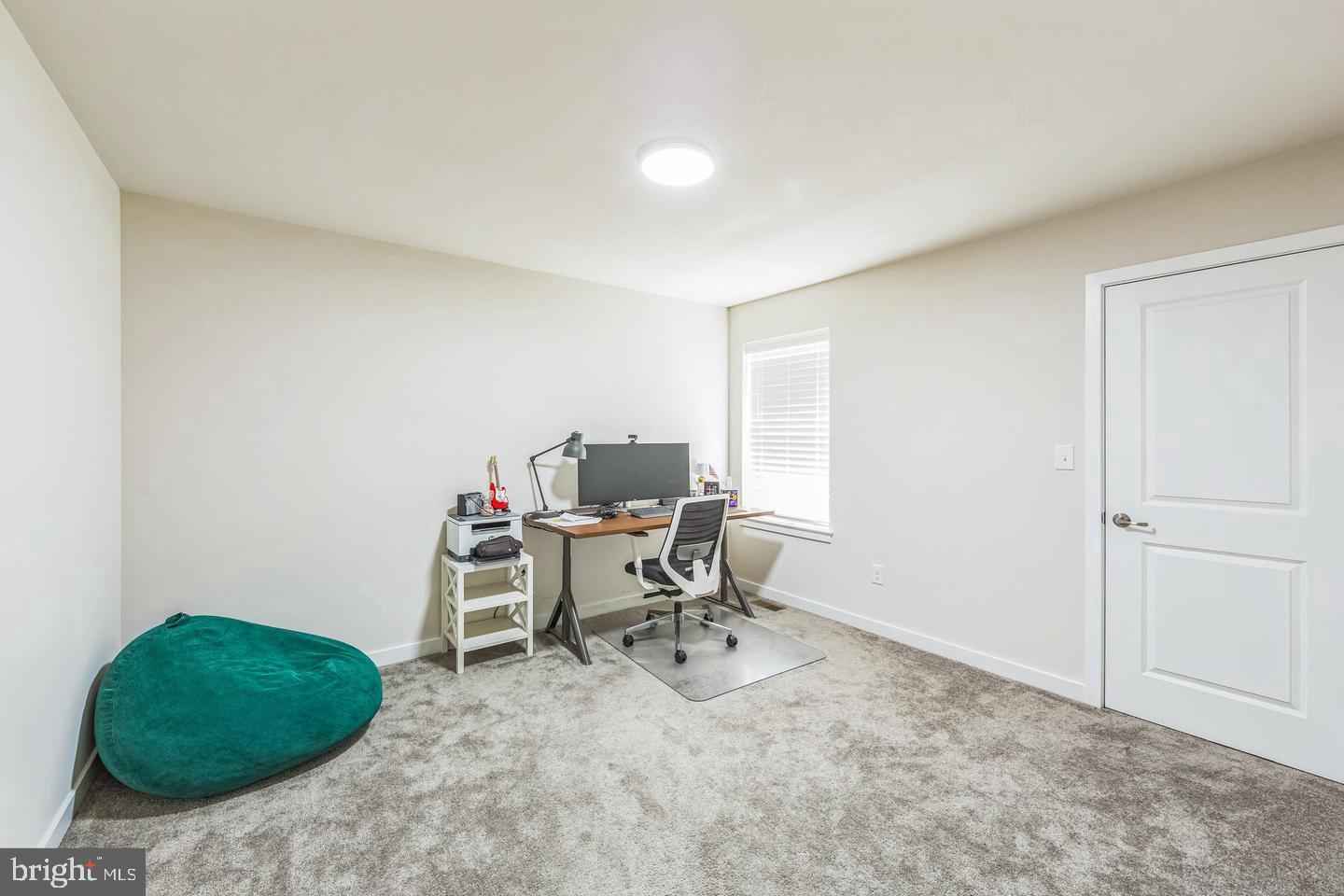 727 Hunsberger Road Spring City, PA 19475 - Photo 22 of 32 a workspace with furniture and a window