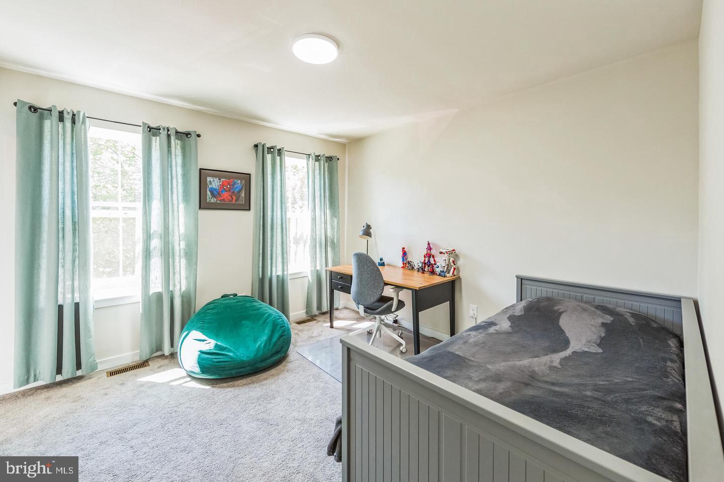 727 Hunsberger Road Spring City, PA 19475 - Photo 23 of 32 a living room with furniture and a window