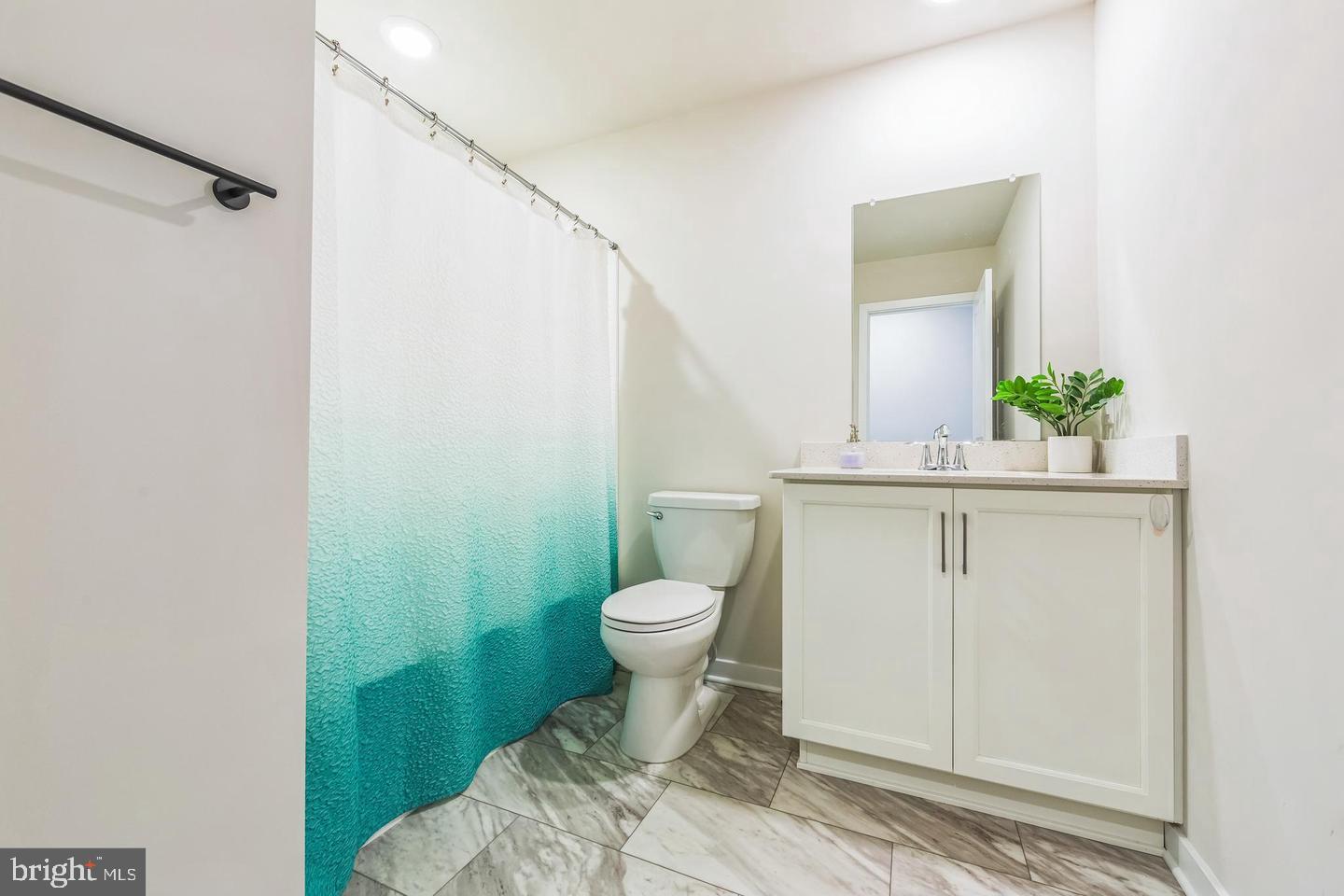 727 Hunsberger Road Spring City, PA 19475 - Photo 25 of 32 a bathroom with a sink toilet and mirror