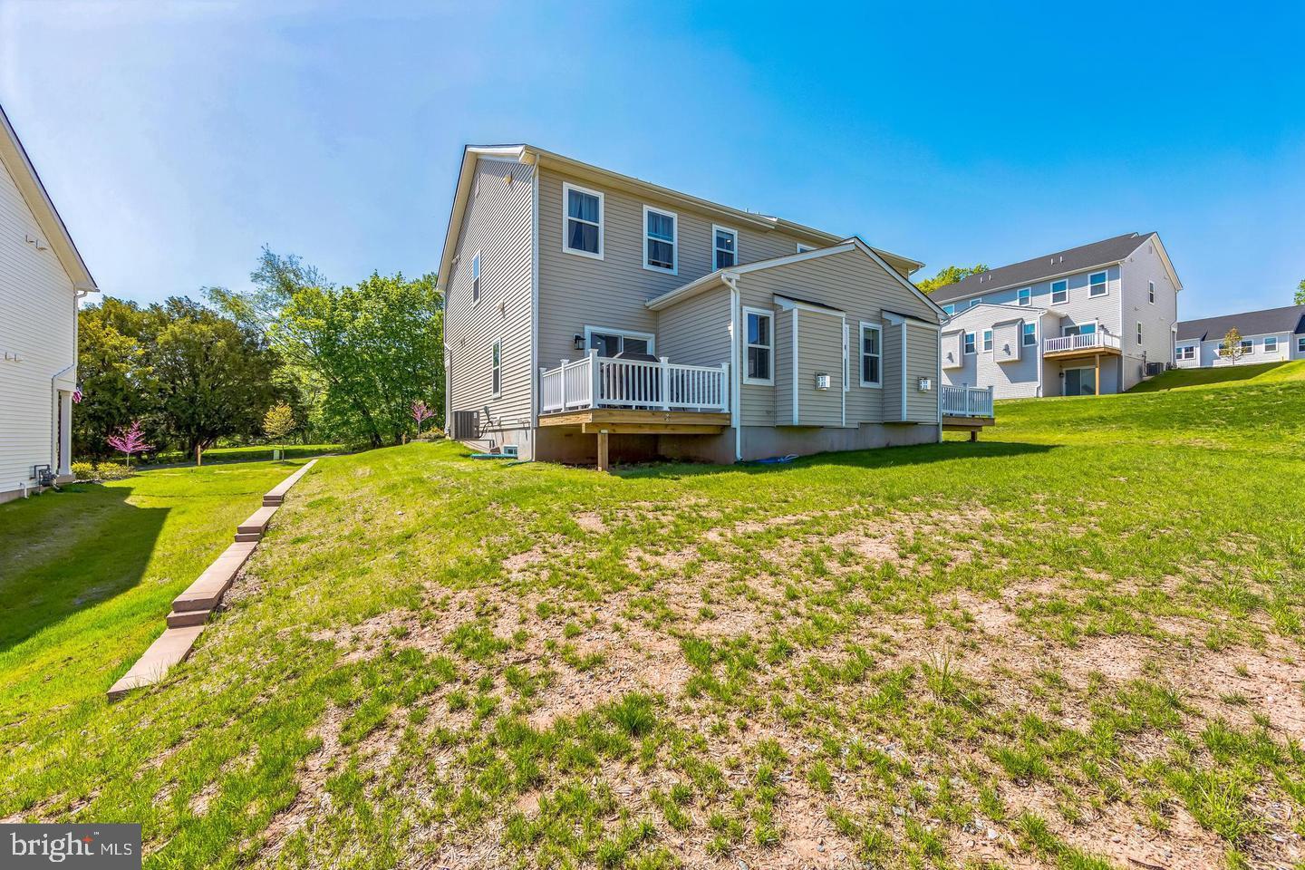 727 Hunsberger Road Spring City, PA 19475 - Photo 30 of 32 a front view of a house with a yard and garage