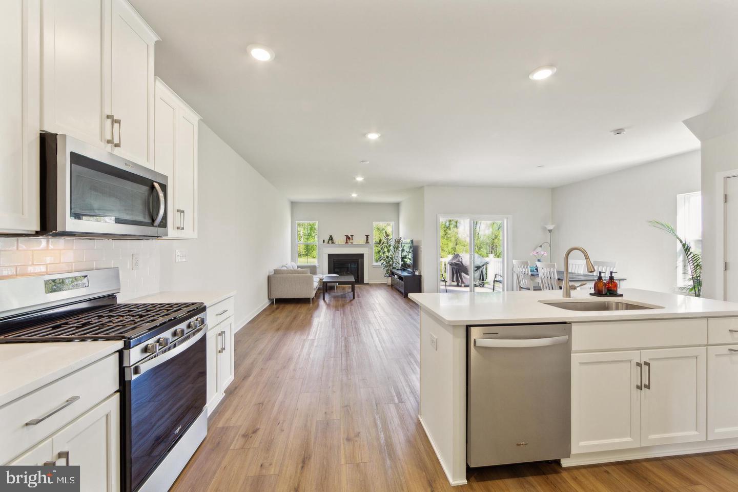 727 Hunsberger Road Spring City, PA 19475 - Photo 7 of 32 a kitchen with sink stove and cabinets