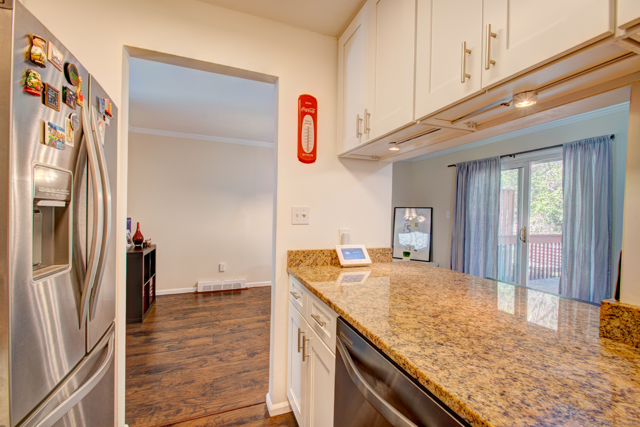 184 Gravel Street, Unit 26 Meriden, CT 06450 - Photo 7 of 27 a kitchen with stainless steel appliances granite countertop a refrigerator and a sink