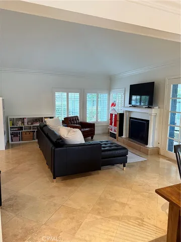 a spacious bathroom with a tub double sink window and mirror