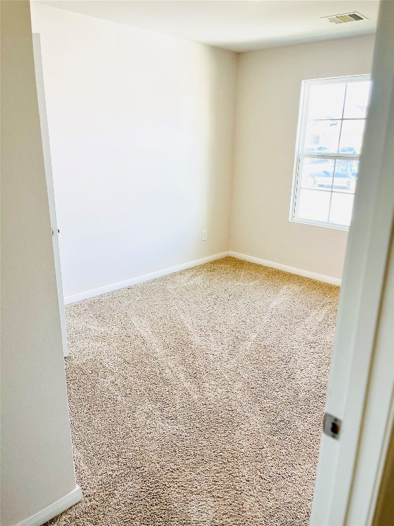 1420 London Way Lockhart, TX 78644 - Photo 8 of 12 an empty room with a window