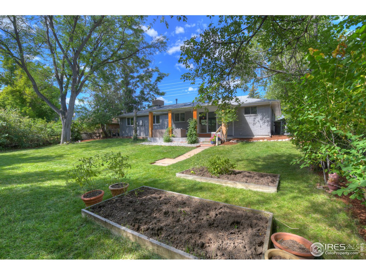 2860 19th Street Boulder, CO 80304 - Photo 26 of 30 Raised beds for gardening, and fruit trees as well