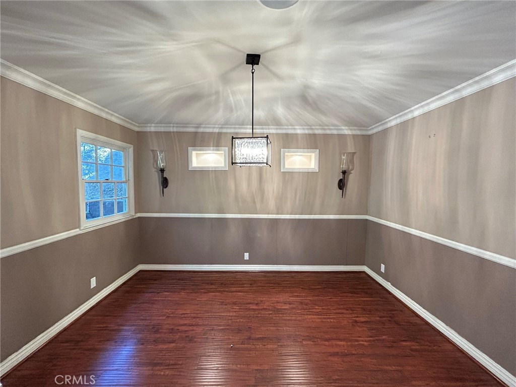 300 South Timken Road Anaheim, CA 92808 - Photo 12 of 40 a view of room with window and hardwood floor