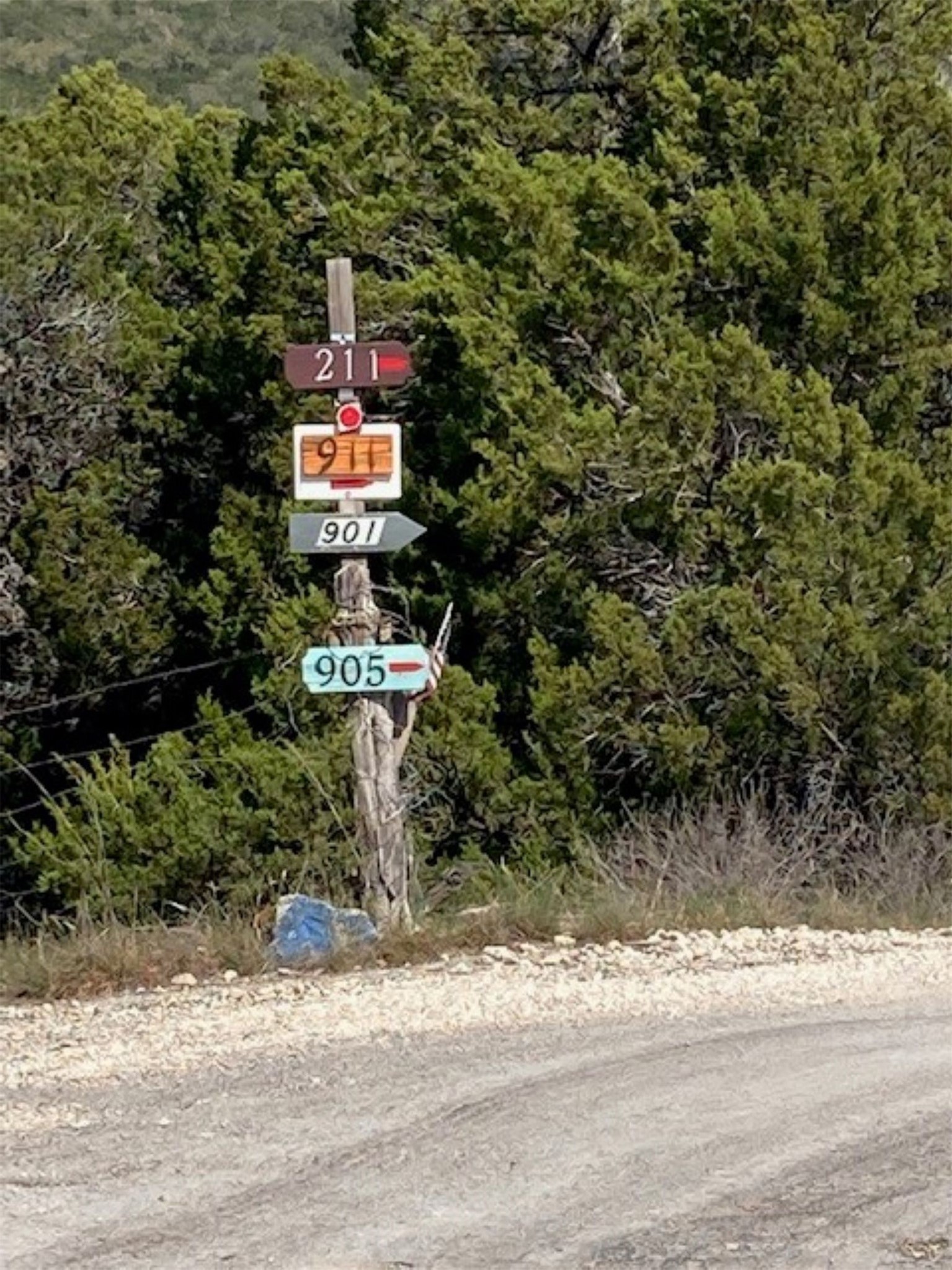 1000 Norwood Road Dripping Springs, TX 78620 - Photo 19 of 22 a sign that is in front of a building