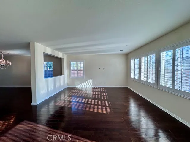 a large kitchen with kitchen island a sink stainless steel appliances and a center island