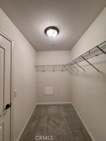 a view of a patio with table and chairs with wooden floor