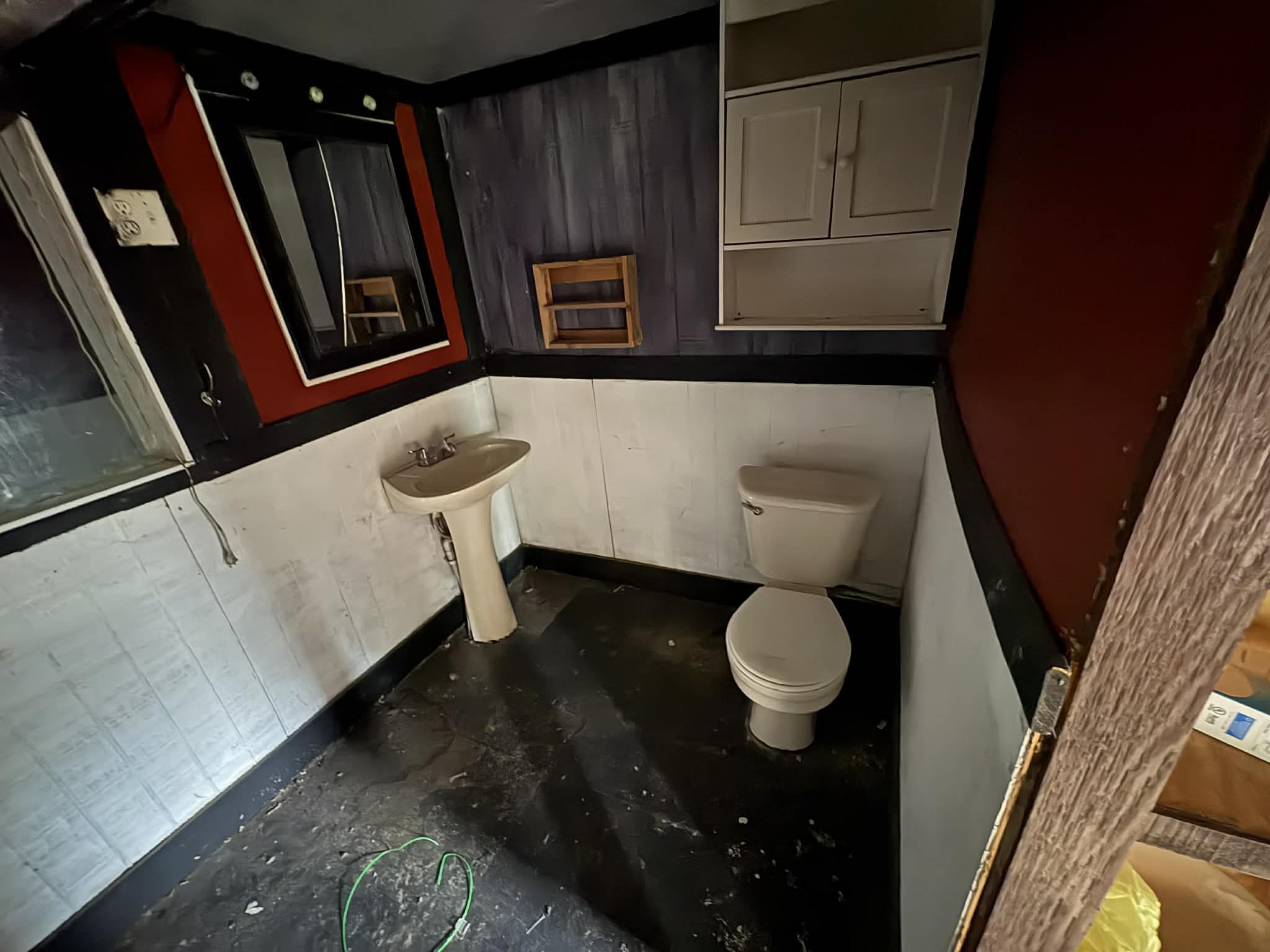 61 Hooker Shepherd, TX 77371 - Photo 11 of 17 a bathroom with a toilet sink and mirror