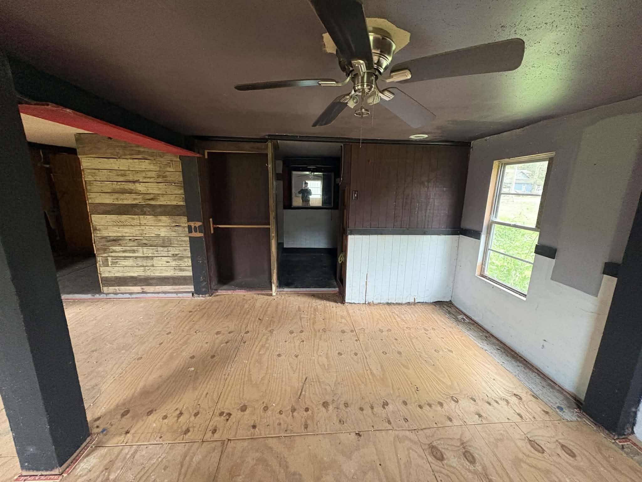 61 Hooker Shepherd, TX 77371 - Photo 16 of 17 a view of an empty room with a window
