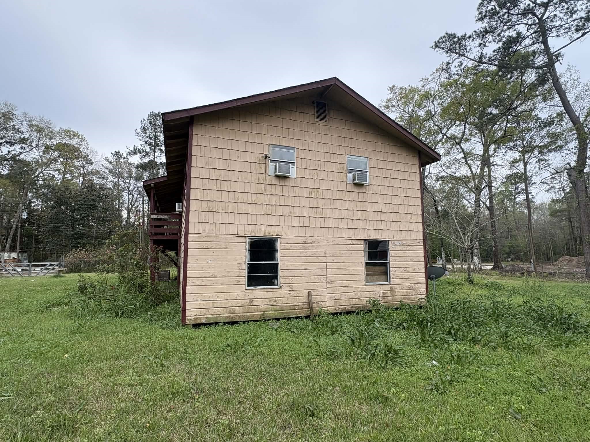61 Hooker Shepherd, TX 77371 - Photo 5 of 17 a view of a house with backyard