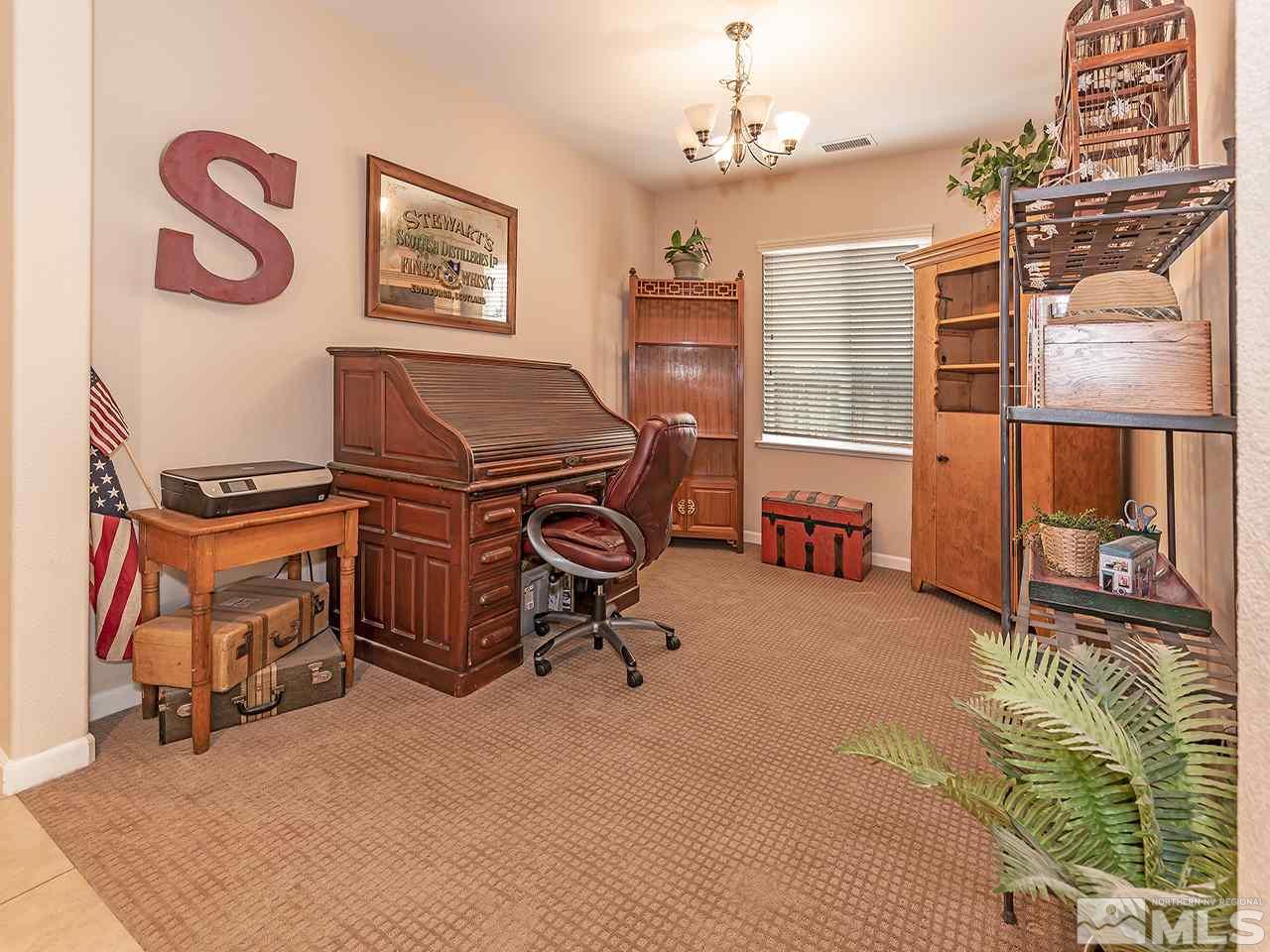 2030 Angel Ridge Drive Reno, NV 89521 - Photo 11 of 22 a view of a workspace with furniture