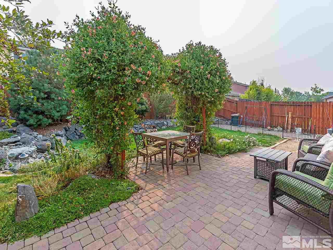 2030 Angel Ridge Drive Reno, NV 89521 - Photo 3 of 22 a view of a backyard with furniture