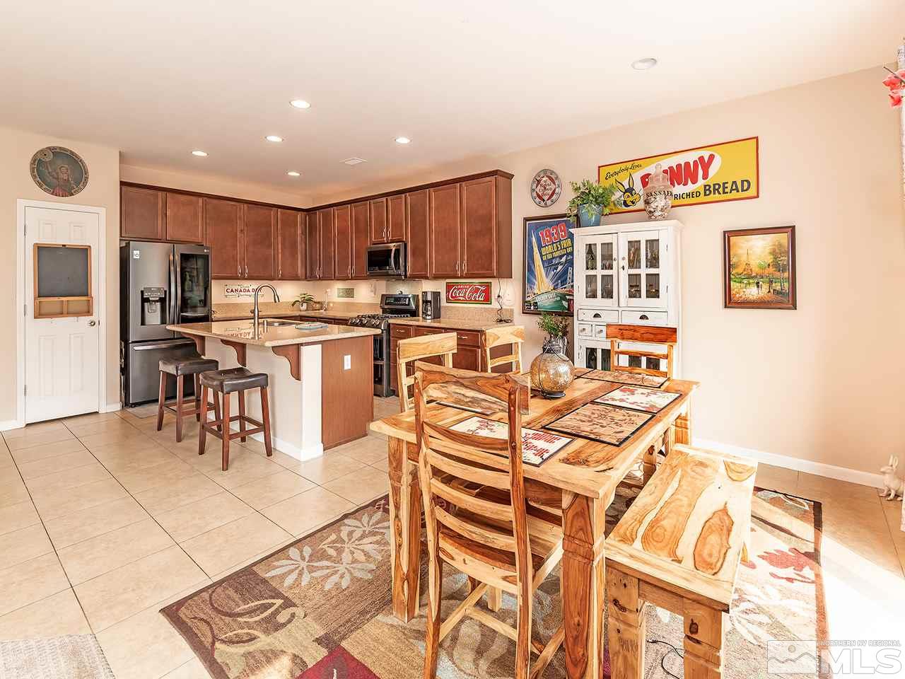 2030 Angel Ridge Drive Reno, NV 89521 - Photo 8 of 22 a view of a dining room with furniture