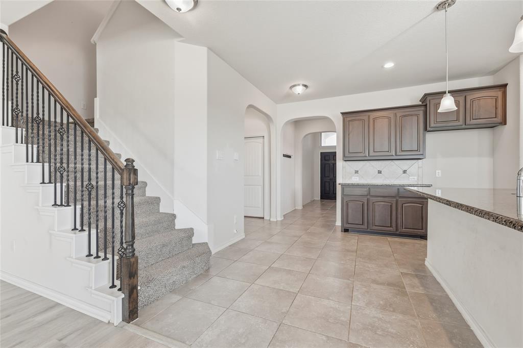 11301 Golden Ridge Lane Haslet, TX 76052 - Photo 13 of 35 a view of a kitchen with electric appliances