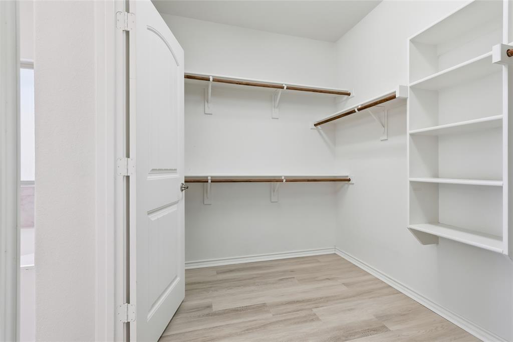 11301 Golden Ridge Lane Haslet, TX 76052 - Photo 21 of 35 a view of an empty walk in closet