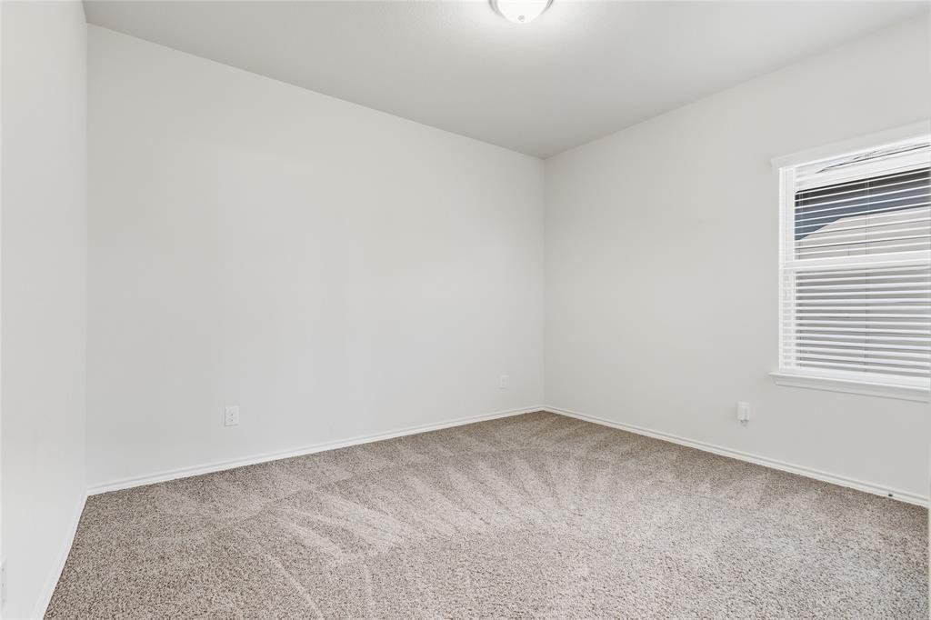 11301 Golden Ridge Lane Haslet, TX 76052 - Photo 24 of 35 an empty room with a window