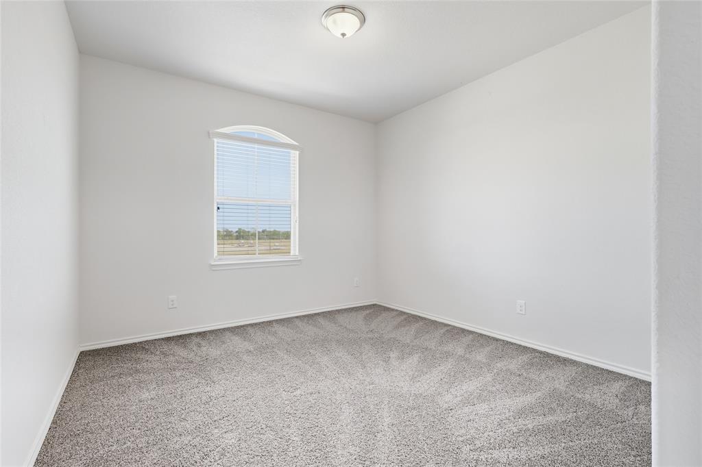 11301 Golden Ridge Lane Haslet, TX 76052 - Photo 26 of 35 an empty room with a window