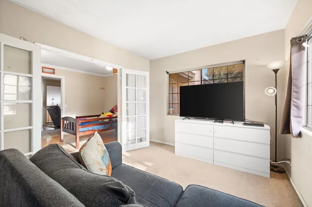 a view of balcony with furniture