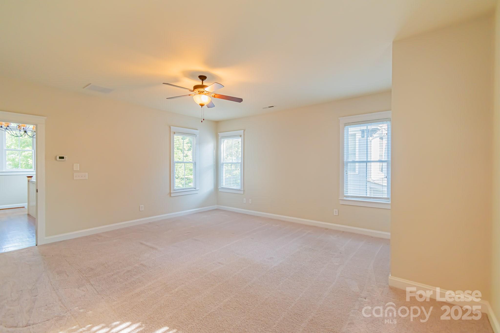 742 Revival Row Fort Mill, SC 29708 - Photo 19 of 32 a view of an empty room with a window