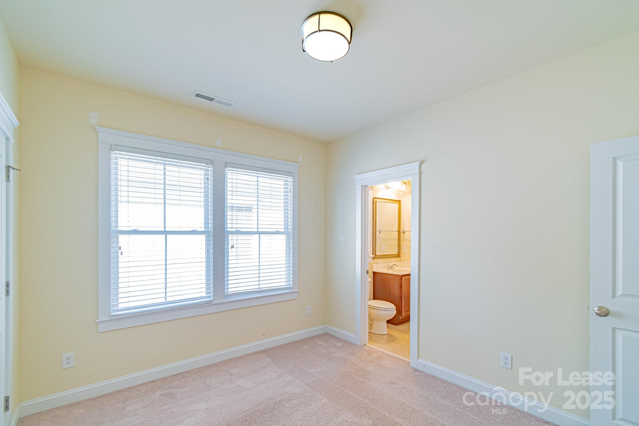 742 Revival Row Fort Mill, SC 29708 - Photo 21 of 32 a view of an empty room with a window