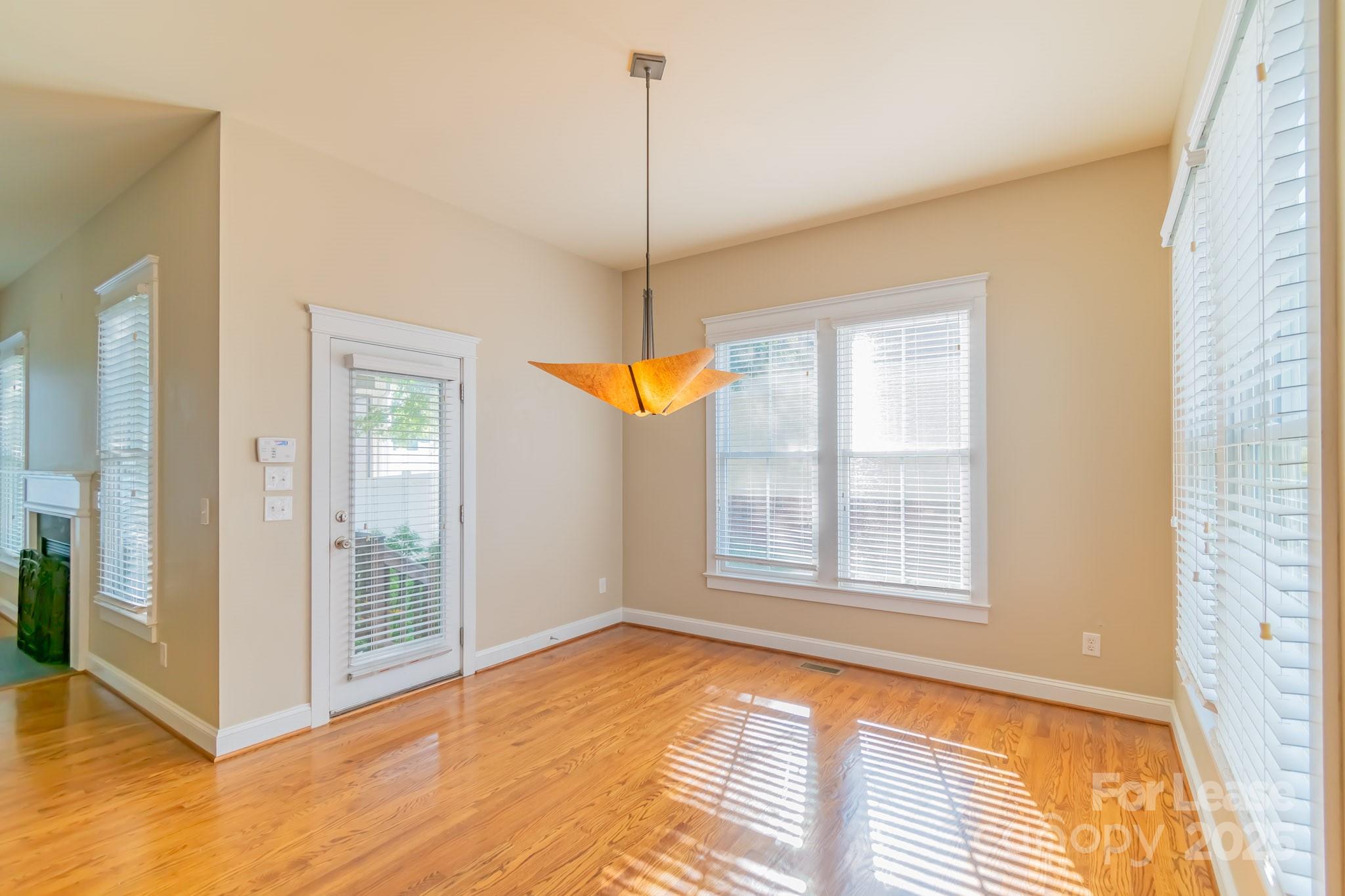 742 Revival Row Fort Mill, SC 29708 - Photo 24 of 32 a view of an empty room with a window