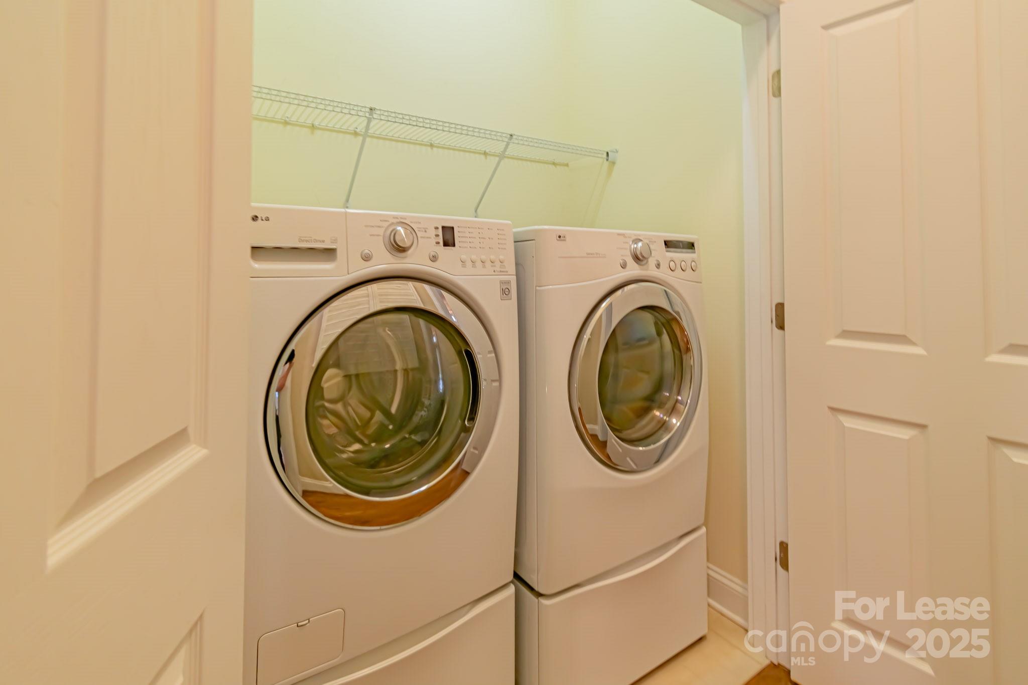 742 Revival Row Fort Mill, SC 29708 - Photo 32 of 32 a utility room with dryer and washer
