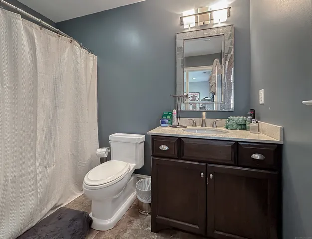 a bathroom with a sink and a toilet