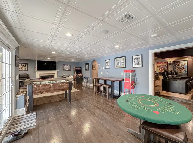 a kitchen with granite countertop a sink and cabinets
