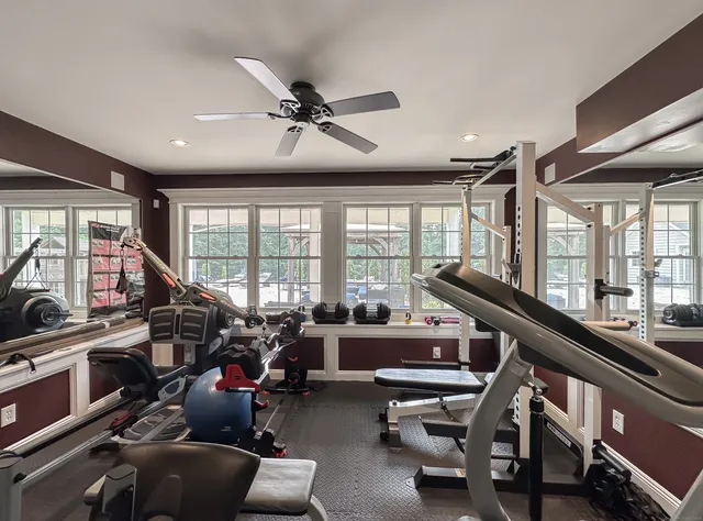 an aerial view of a house with swimming pool garden and patio