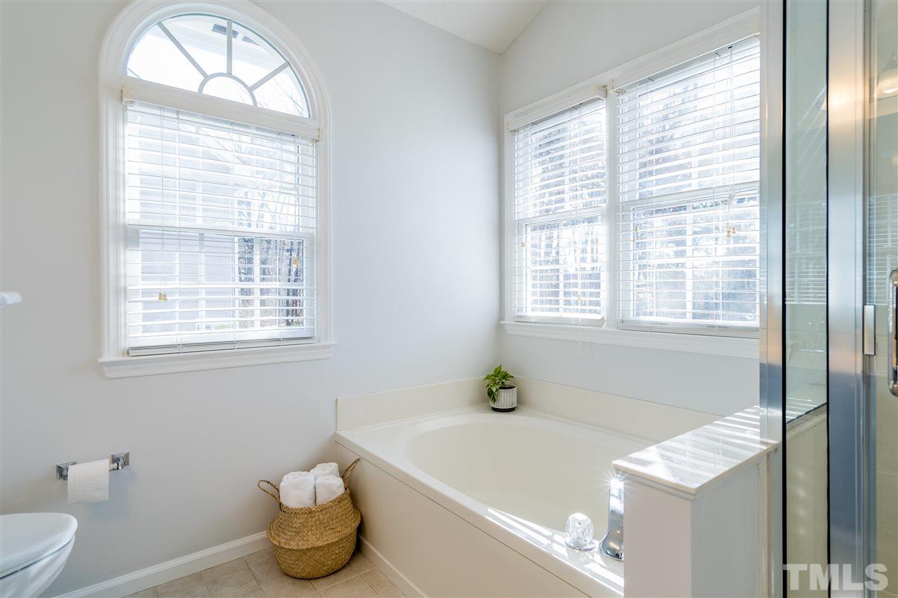 5221 Denmead Way Raleigh, NC 27613 - Photo 21 of 28 Garden tub with lots of natural light---perfect for relaxing and enjoying being home!