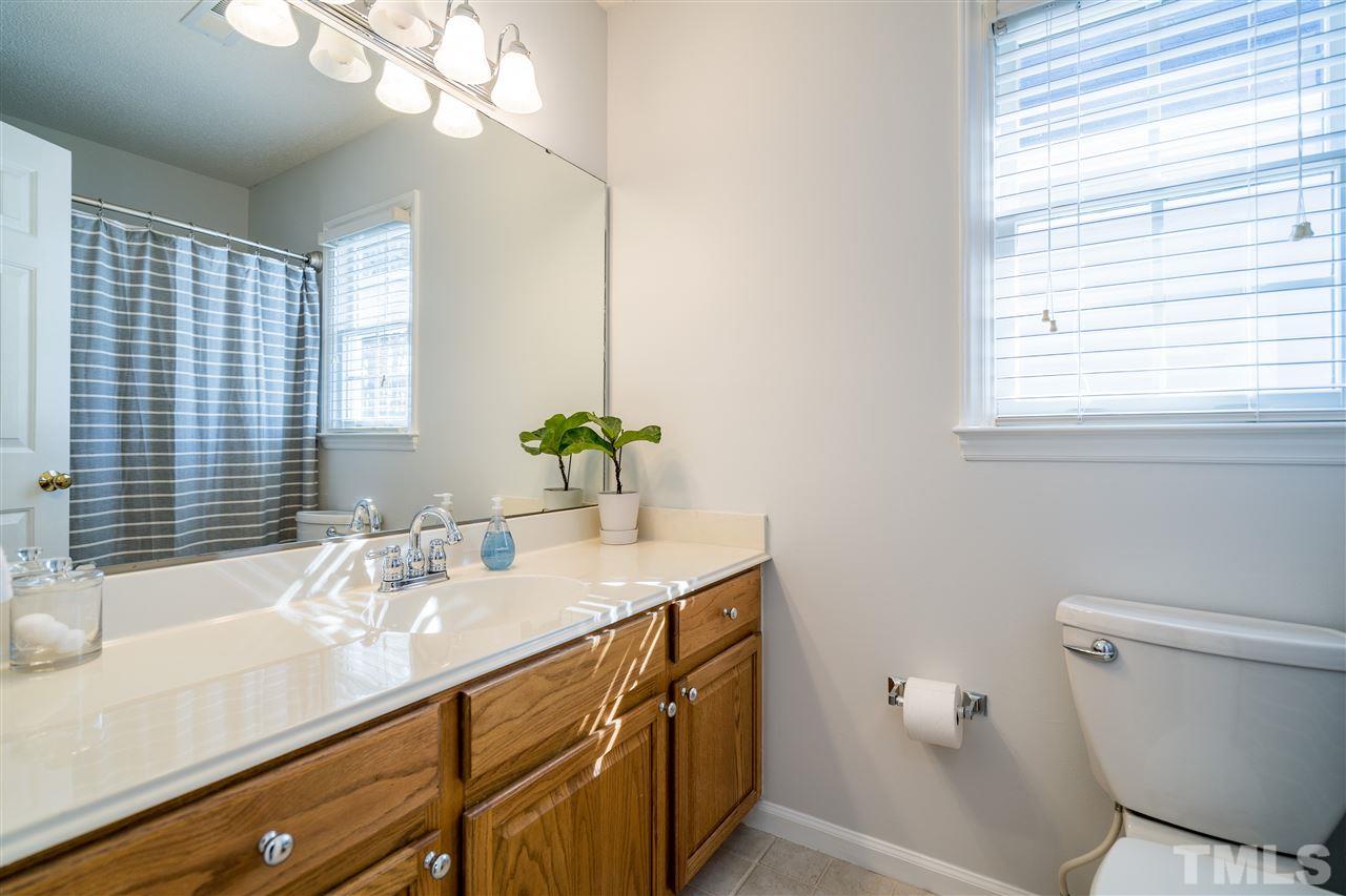 5221 Denmead Way Raleigh, NC 27613 - Photo 24 of 28 Beautiful bath for secondary bedrooms upstairs to share!