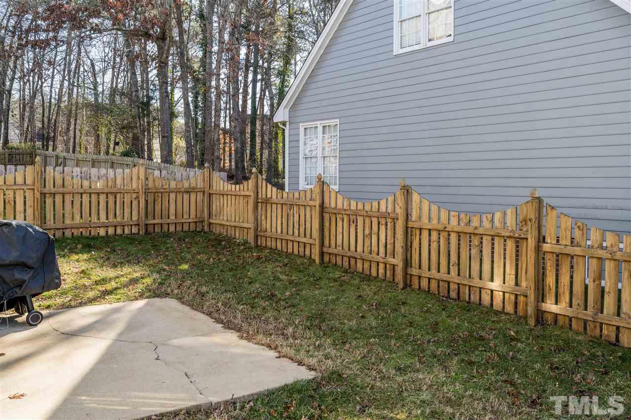 5221 Denmead Way Raleigh, NC 27613 - Photo 26 of 28 Fenced backyard with patio! Ready for cookouts and hanging out!