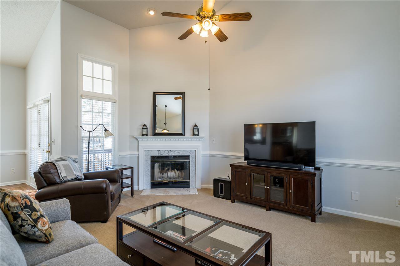 5221 Denmead Way Raleigh, NC 27613 - Photo 4 of 28 Vaulted ceilings, natural light, ceiling fan and open plan!
