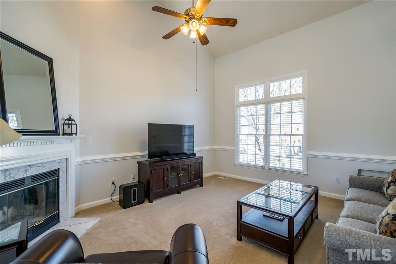 5221 Denmead Way Raleigh, NC 27613 - Photo 6 of 28 Vaulted ceilings, natural light, ceiling fan and open plan!