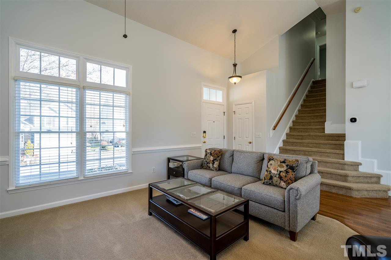5221 Denmead Way Raleigh, NC 27613 - Photo 7 of 28 Vaulted ceilings, natural light, ceiling fan and open plan!